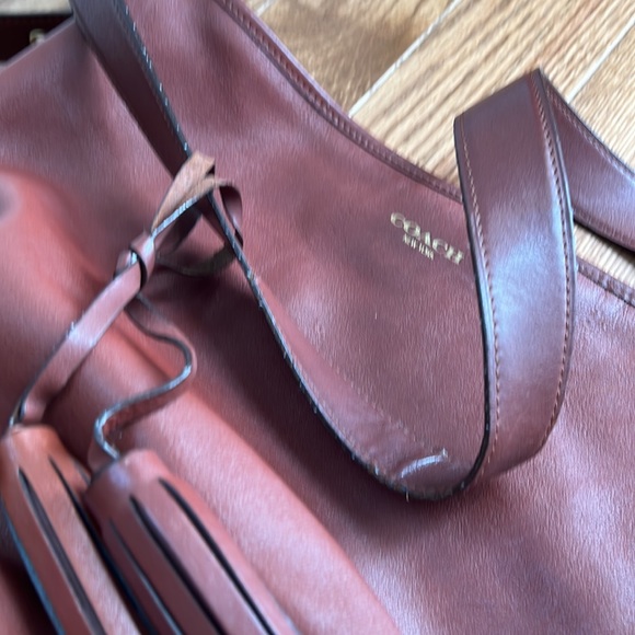 Saddle-color Coach Crossbody Bucket - Picture 7 of 14